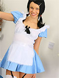 Stunning brunette Sophie looking wonderful in a sexy Alice outfit and white stockings.